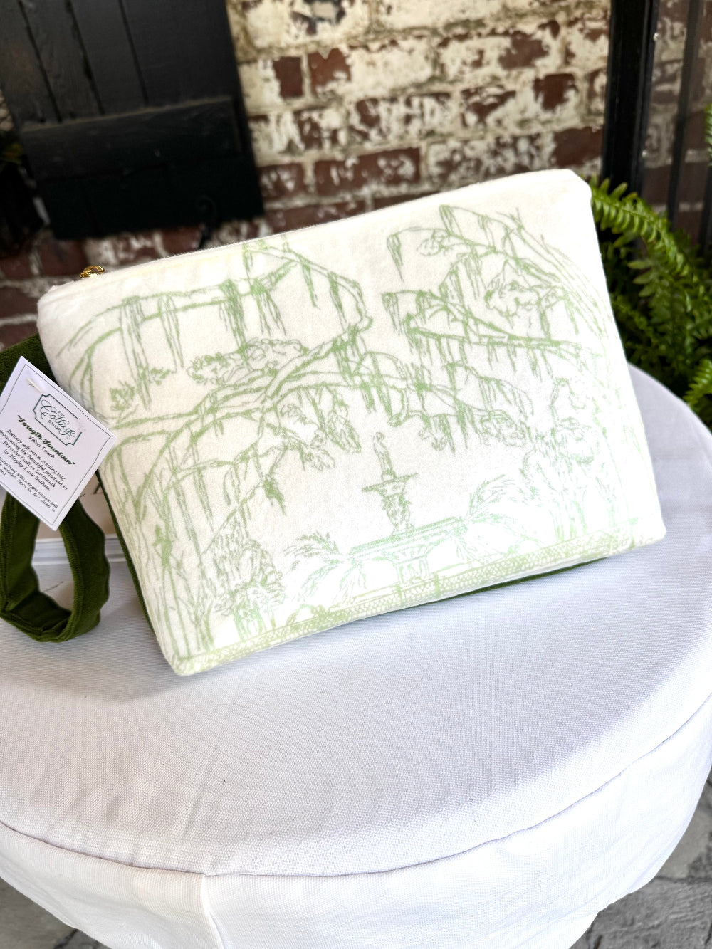 White pouch with green Forsyth Fountain in Savannah GA on velvet 